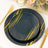 Navy blue plates with gold stripes, elegantly arranged on a table setting.