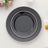 Black dinner plates with silver beaded rims, stacked elegantly.