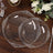 Elegant clear plastic plates set with intricate lace design, perfect for events.