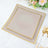 Elegant stacked plates with gold trim on a soft background.