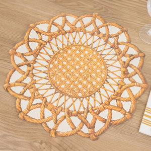 Rattan-style round placemat on a wooden table