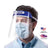 Protective face shield worn over a medical mask by a person.