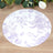 Round floral placemat with purple designs on a white background.