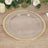 Clear plate with a gold rim on a wooden table.