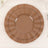 Brown decorative plates stacked in a layered design.