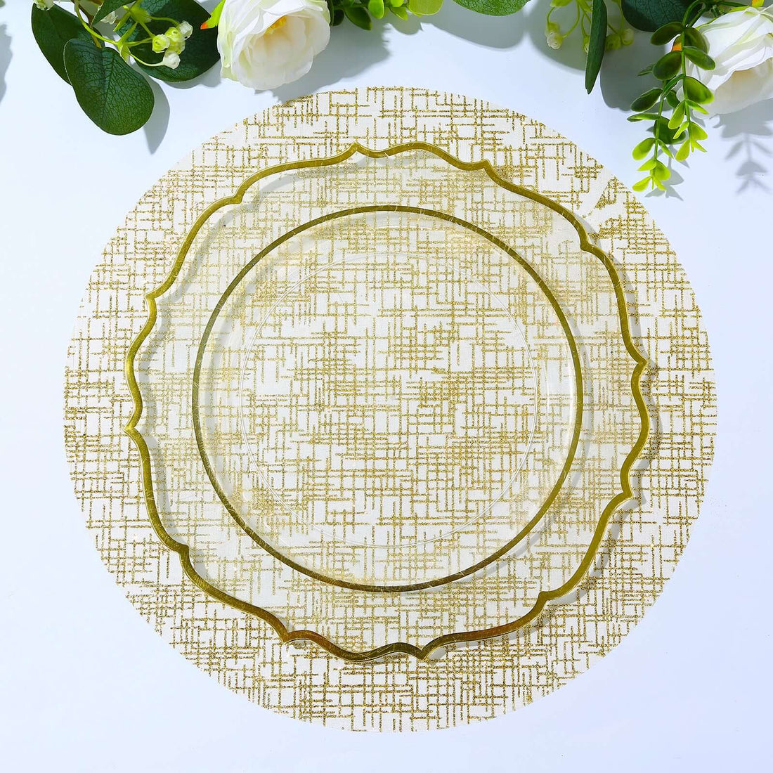 Gold decorative plate on a patterned table setting.
