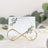 Gold infinity card holder with botanical design card.