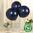 Navy biodegradable balloons with eco-friendly label on a plain background