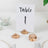 Table number card with decorative gem accents for event decoration.
