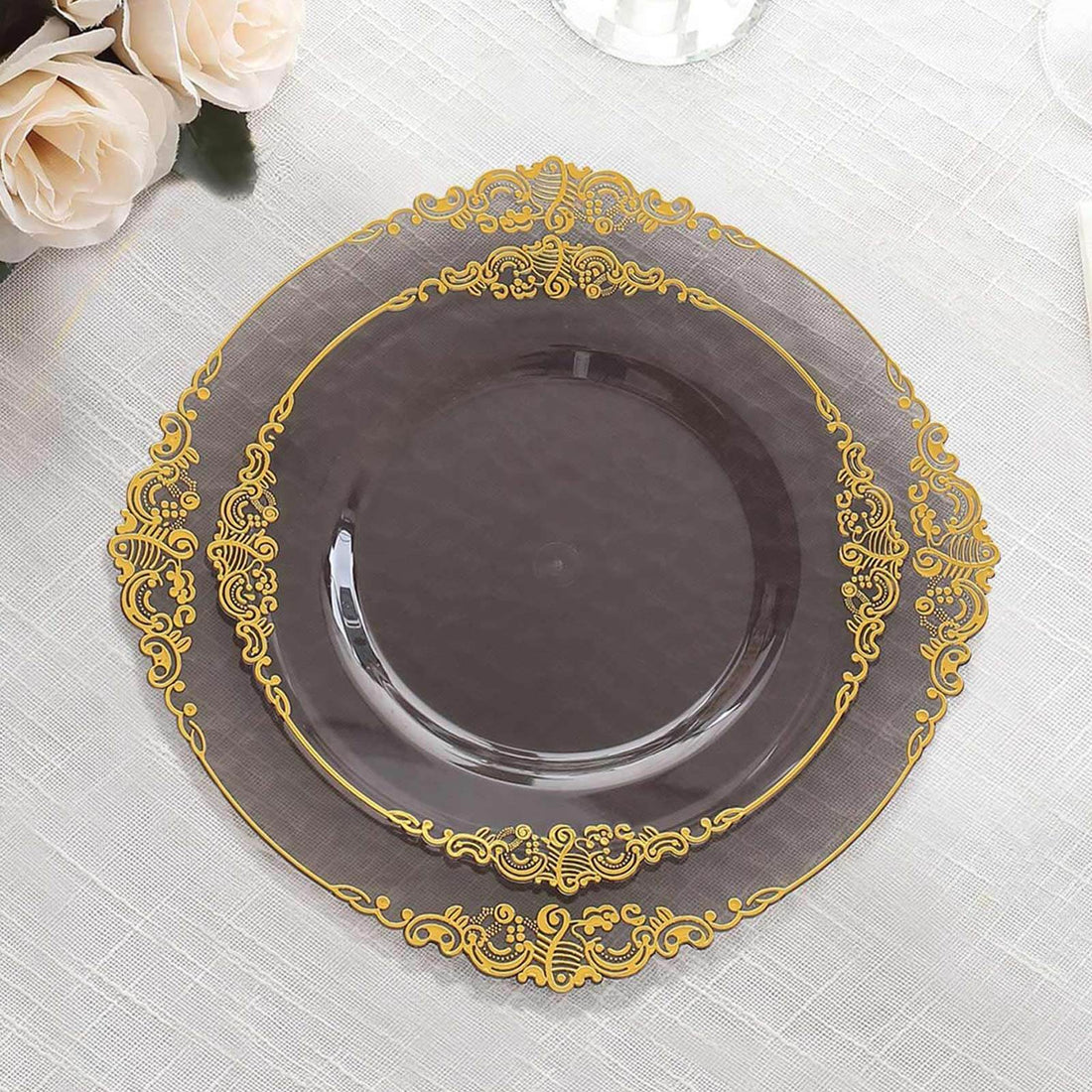 Elegant decorative plate with gold accents on a dark background.