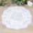Decorative floral placemat in lavender and white design.