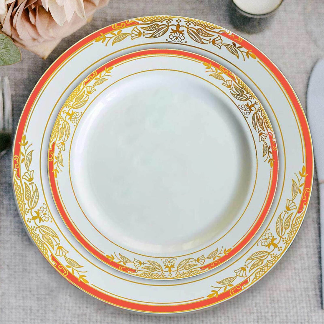 Elegant dinner plates with floral designs and gold accents.