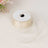 Ivory sheer ribbon spool with a flowing ribbon tail