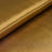 Shiny golden satin fabric folded neatly. #whtbkgd