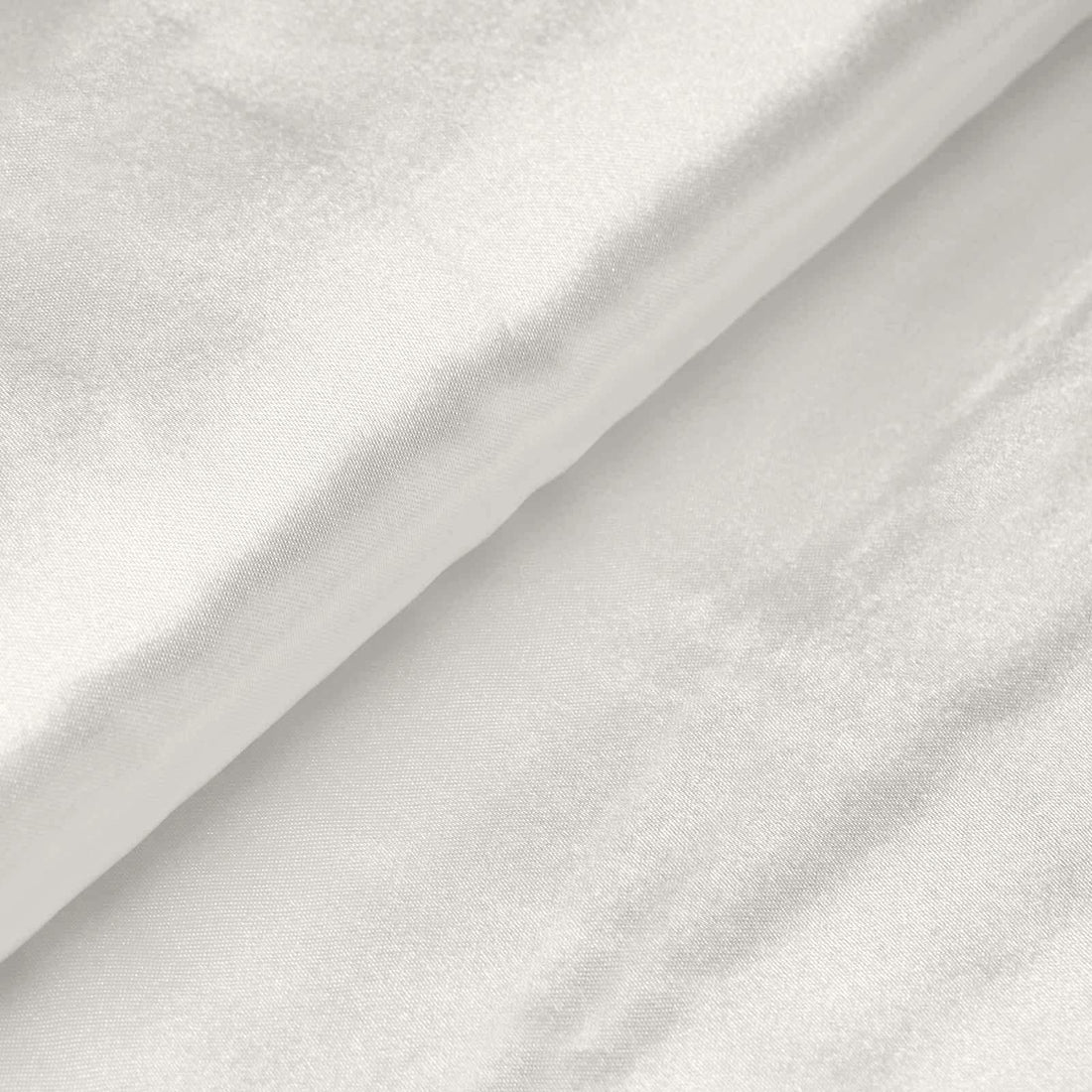 White satin fabric folds showcasing smooth texture and sheen. #whtbkgd