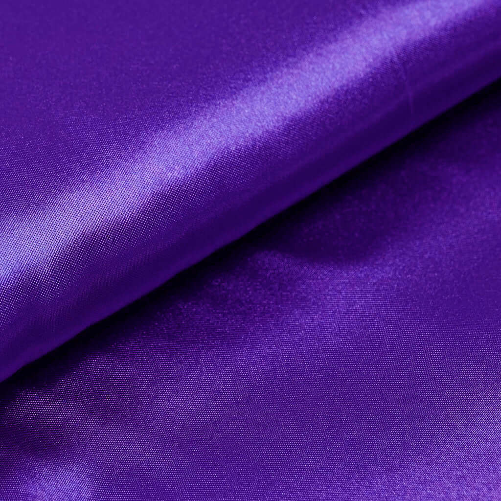 Purple satin fabric with a smooth, glossy texture. #whtbkgd