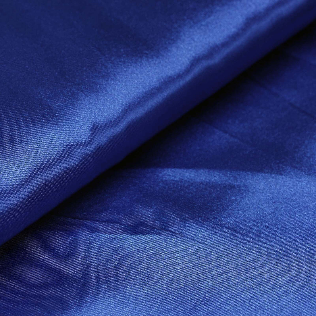 Royal blue satin fabric with a smooth, lustrous finish. #whtbkgd