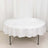 Round white tablecloth draped over a circular table