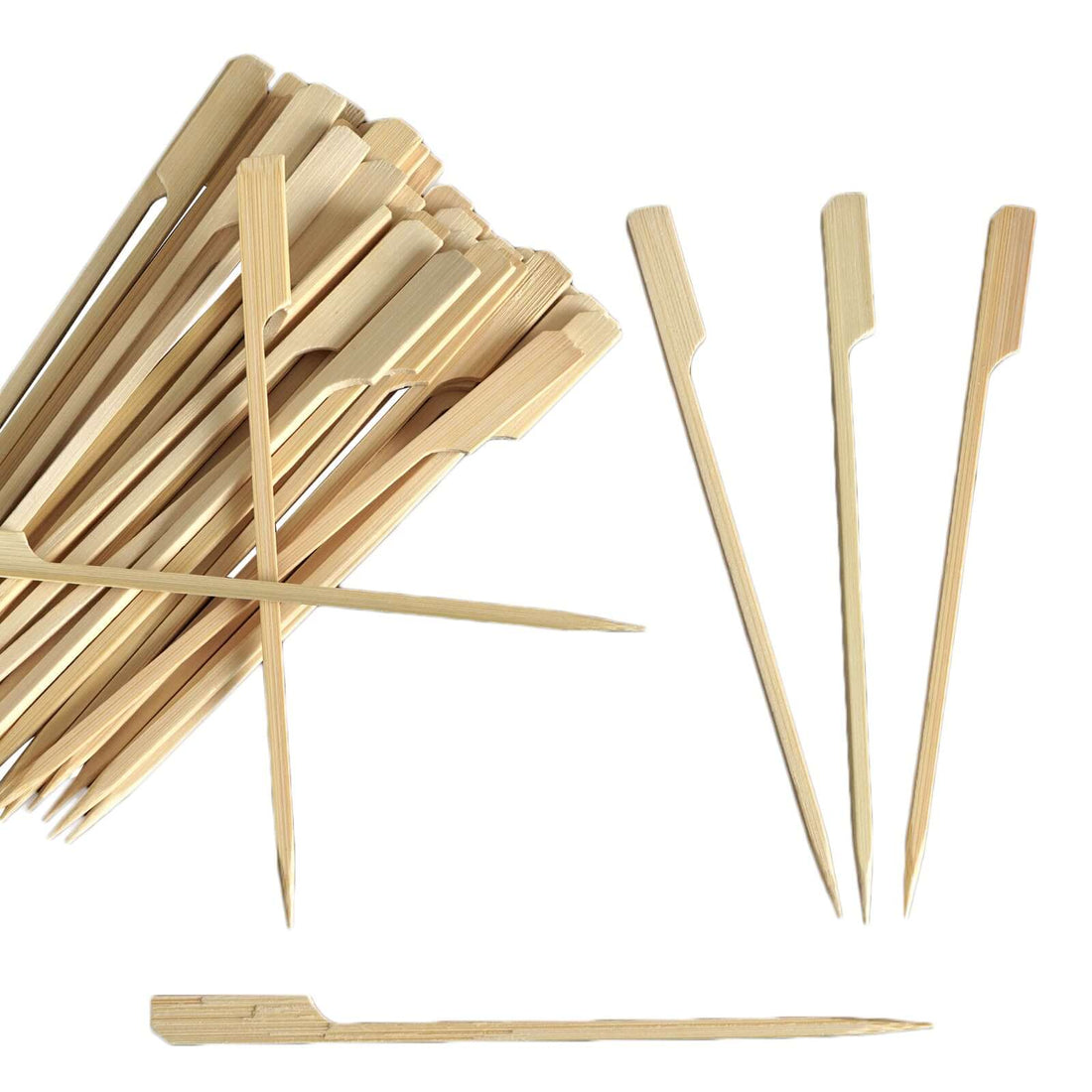 Bamboo skewers in various sizes on a white background