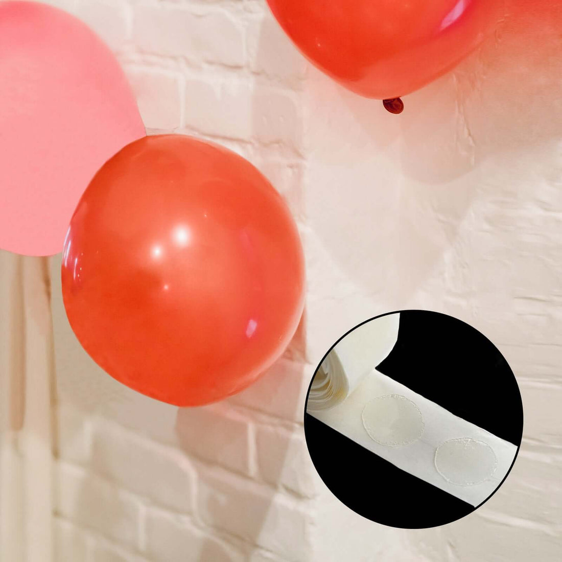 Red and pink balloons with adhesive dots for easy hanging.