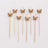 Wooden butterfly cake toppers on skewers for decoration