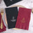 Personalized wedding napkins in black and burgundy with custom printing.