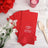 Personalized red napkins with heart design, perfect for weddings or events.