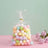 Colorful pastel foam balls in a clear bag for craft projects.