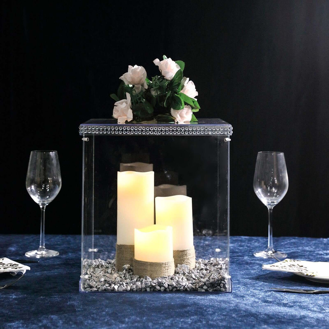 Elegant candle holder with flowers, perfect for table settings and decor.