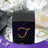 Black gift box adorned with rhinestones in a stylish arrangement.