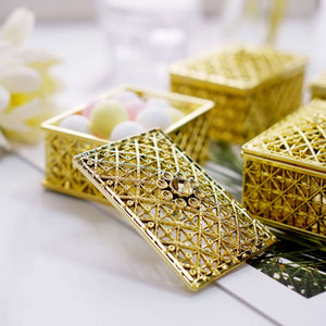 Golden decorative boxes with colorful balls inside