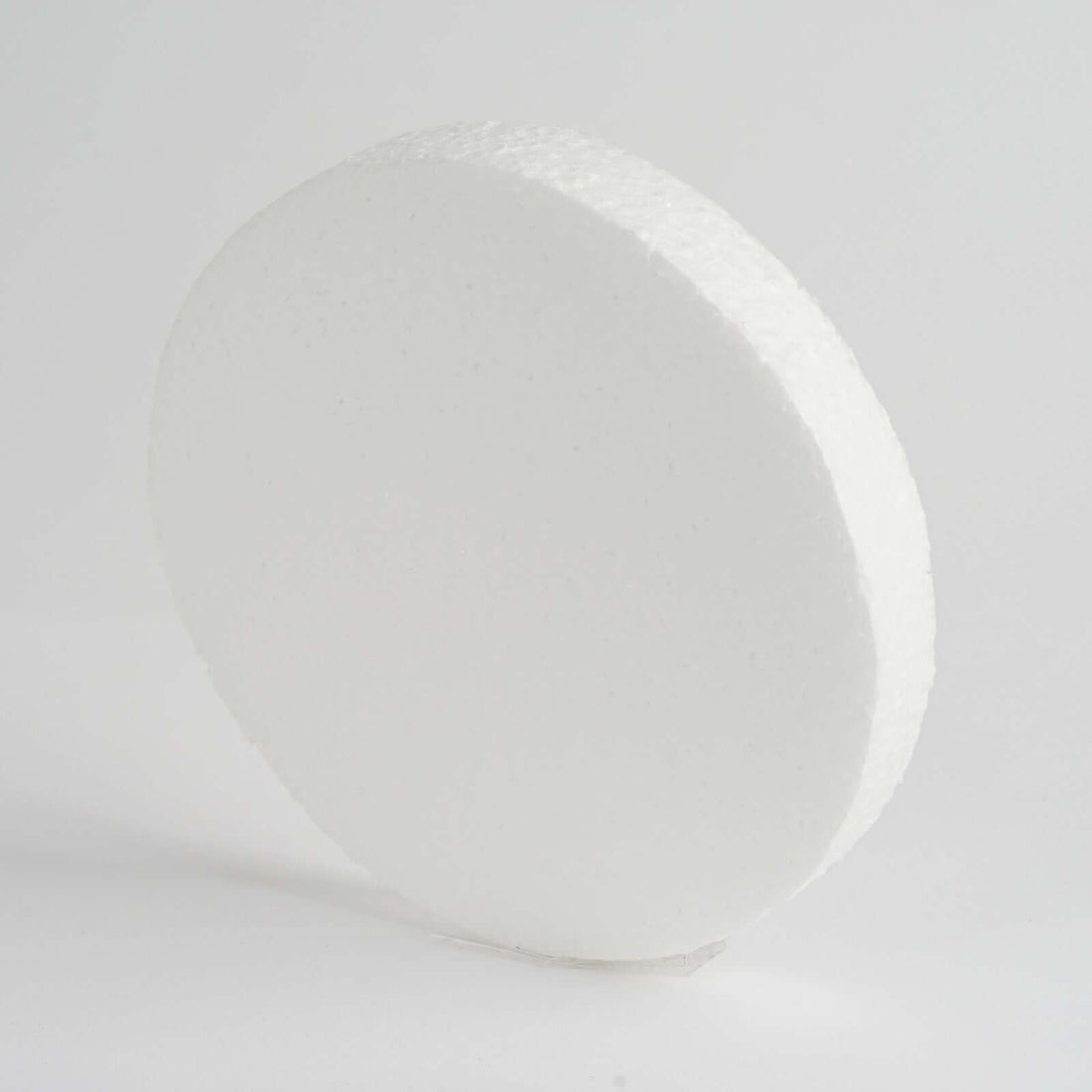 White foam disc on a plain background for crafting or display purposes