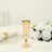 Elegant gold-rimmed champagne flute on a table with white roses