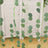 Green eucalyptus garland hanging in a bright setting.