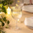 Elegant ribbed glass goblet with a stem, perfect for special occasions.