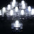 LED tea light candles in clear holders, ideal for ambiance and decor. #whtbkgd