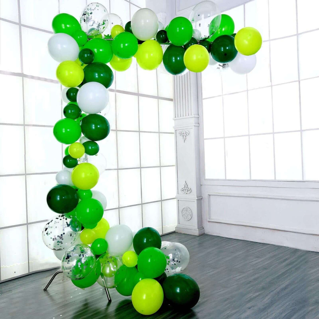 Green and white balloon arch decoration for events and celebrations. #whtbkgd
