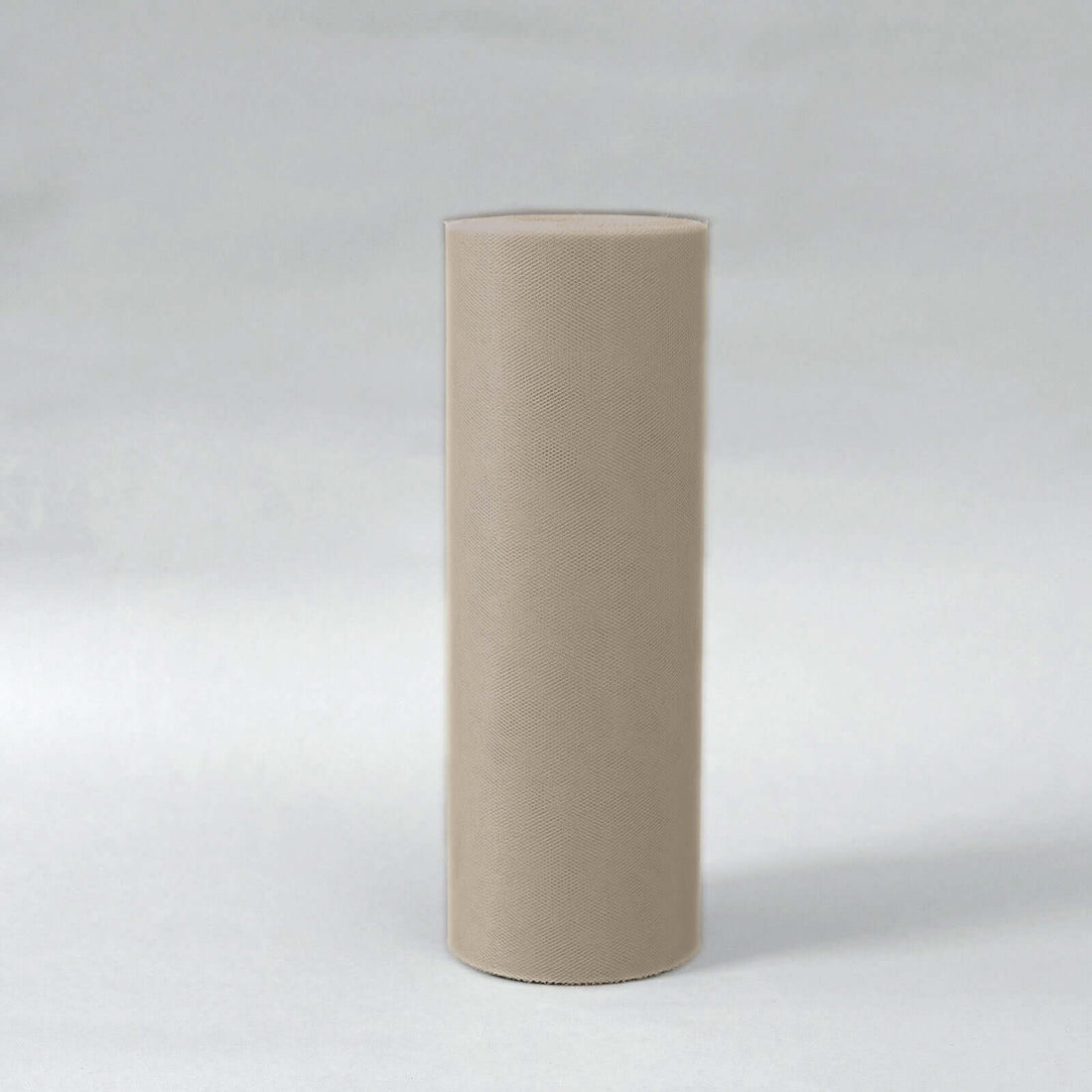 Beige tulle fabric roll on white background
