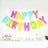 Colorful "Happy Birthday" balloon banner displayed at a festive celebration.