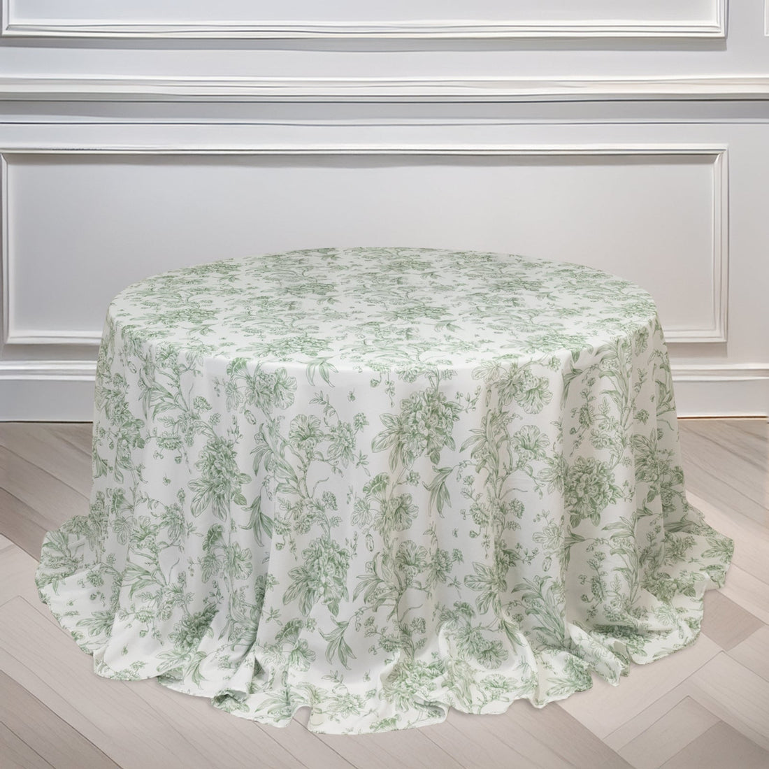 Round floral tablecloth in light green and white fabric