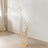 Elegant gold and clear glass flower vase with multiple tiers.