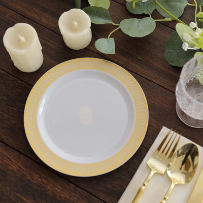Elegant white plate with gold rim, set on a rustic wooden table.