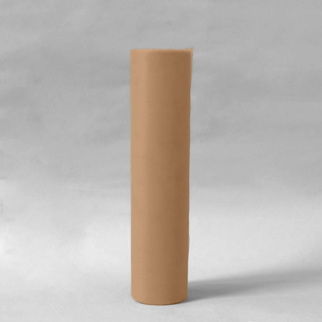 Brown craft paper roll on a plain backdrop.