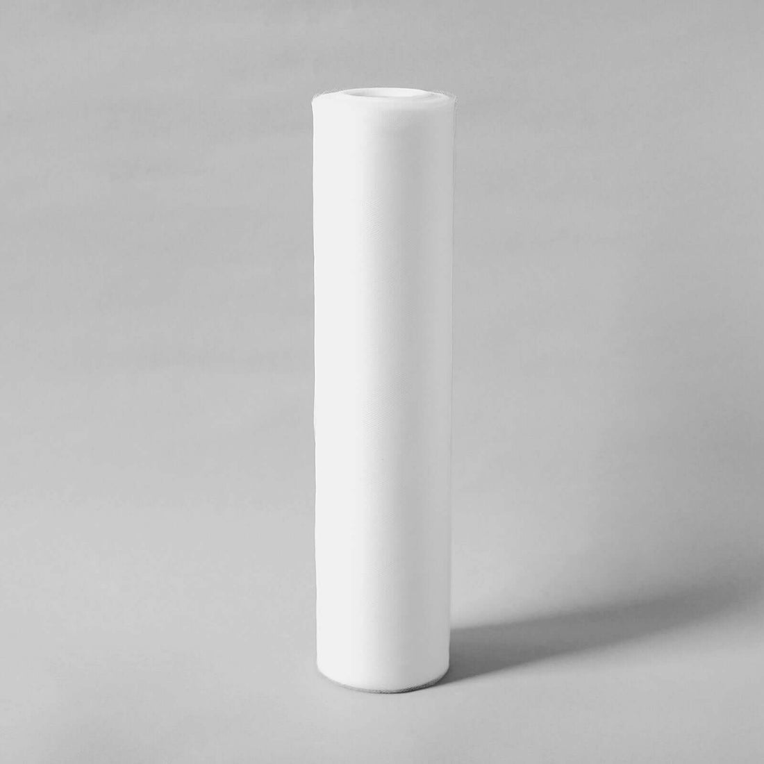 White roll of paper on a plain background.