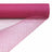 Pink tulle fabric roll with a fine mesh design. #whtbkgd