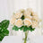 Bouquet of cream artificial roses in a clear glass vase.