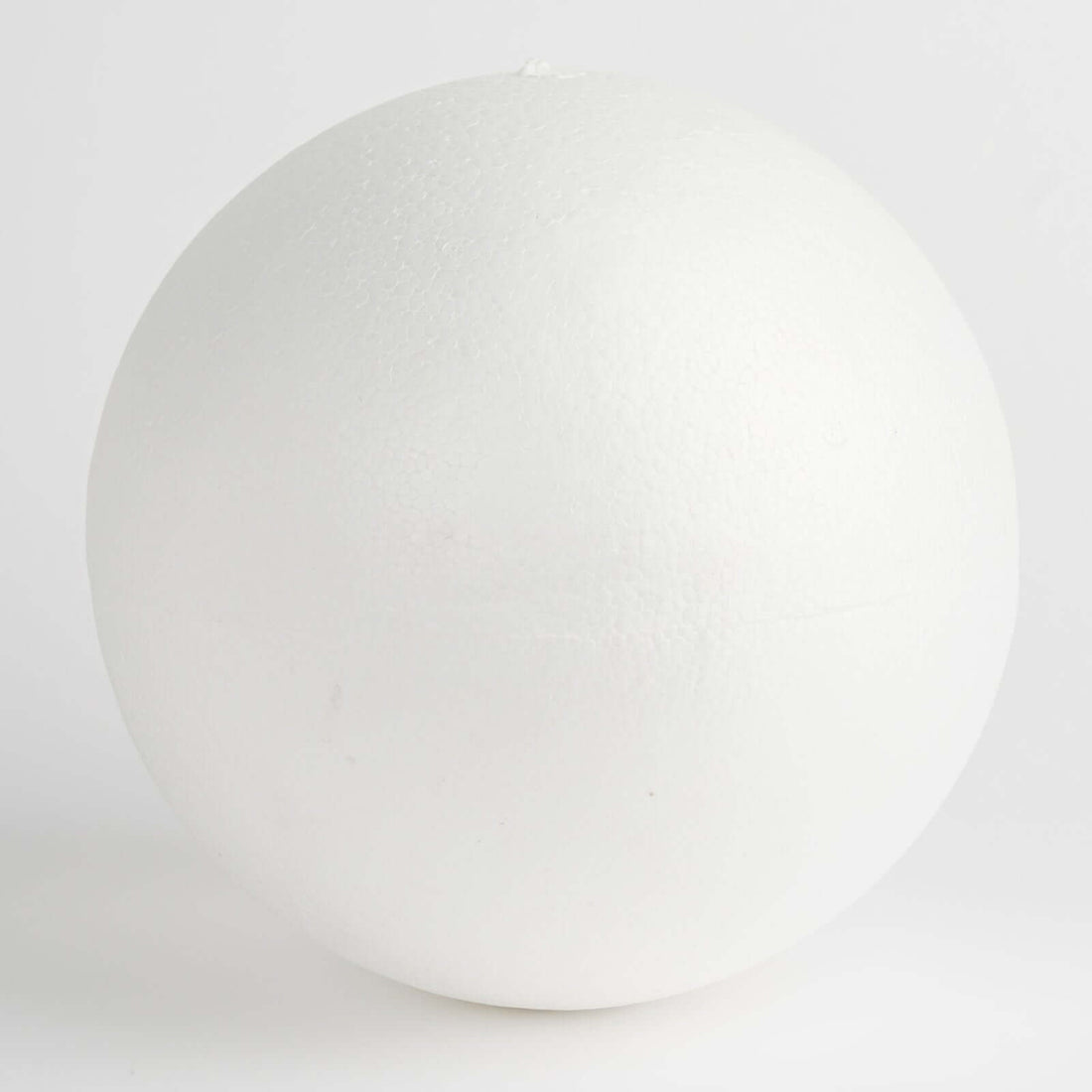 White foam ball on a plain background