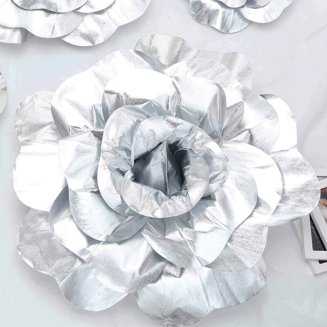 Silver paper flower decoration for events and home decor. #whtbkgd