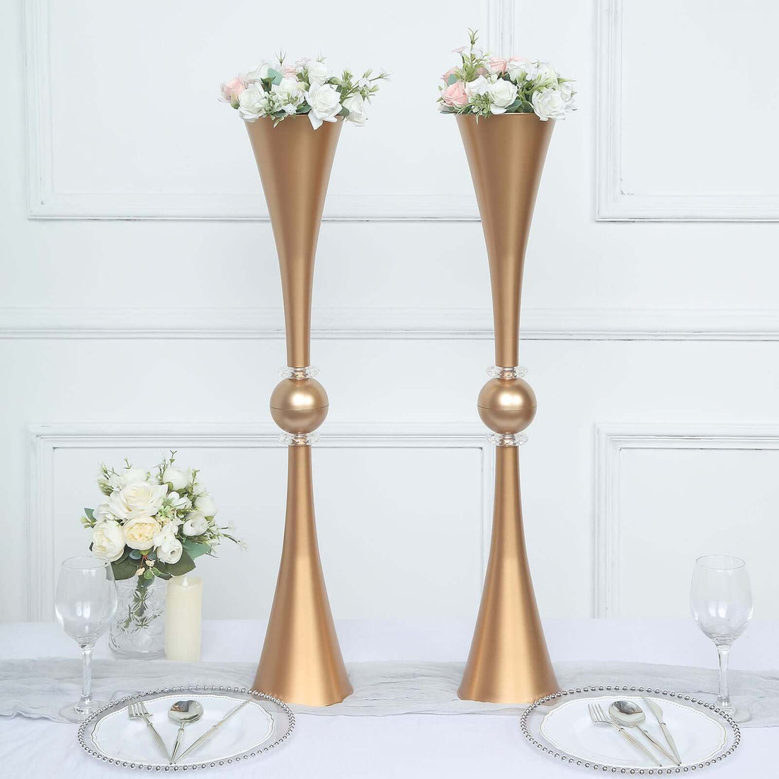Elegant gold flower vases with faux flowers for decor