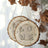 Wooden love sign decor with hearts, hanging on a natural backdrop.